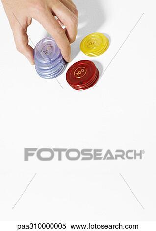 Hand stacking poker chips View Large Photo Image Stock Photography - Hand stacking poker chips. Fotosearch
