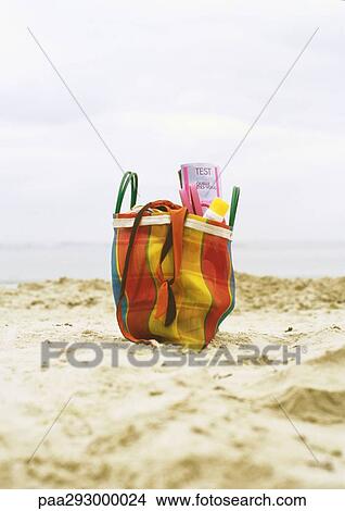Beach bag on beach View Large Photo Image Picture - Beach bag on beach. Fotosearch