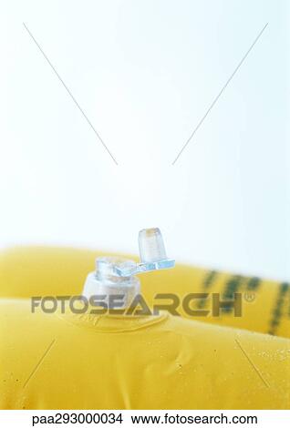 Valve of innertube, close-up View Large Photo Image Picture - Valve of innertube, close-up. Fotosearch