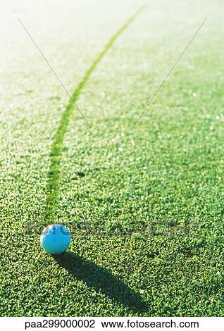 Golf ball on dew-covered green View Large Photo Image Stock Image - Golf ball on dew-covered green. Fotosearch