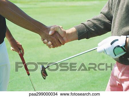 Golfers shaking hands View Large Photo Image Picture - Golfers shaking hands. Fotosearch