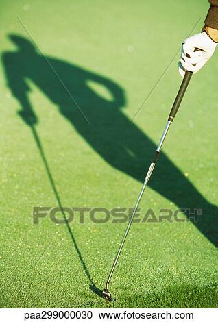 Shadow of golfer View Large Photo Image Stock Image - Shadow of golfer. Fotosearch