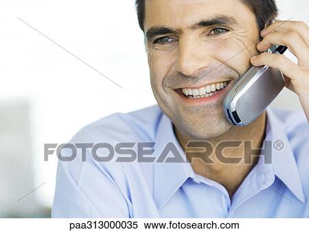 Businessman using cell phone, close-up View Large Photo Image Stock Photography - Businessman using cell phone, close-up. Fotosearch