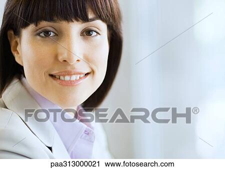 Woman in suit smiling, portrait View Large Photo Image Stock Image - Woman in suit smiling, portrait. Fotosearch