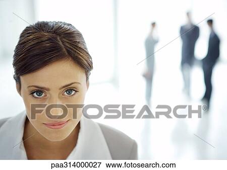 Businesswoman in office lobby, portrait View Large Photo Image Stock Photo - Businesswoman in office lobby, portrait. Fotosearch
