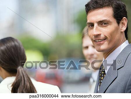 Businessman smiling View Large Photo Image Picture - Businessman smiling. Fotosearch