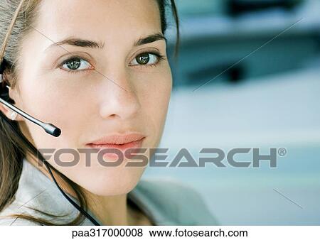Woman wearing headset View Large Photo Image Stock Photo - Woman wearing headset. Fotosearch