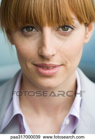 Woman with bangs smiling, portrait View Large Photo Image Stock Photo - Woman with bangs smiling, portrait. Fotosearch
