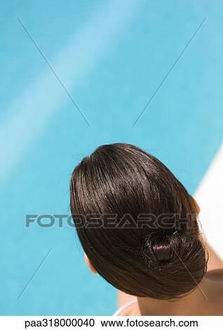 Back of woman's head, pool in background View Large Photo Image Stock Image - Back of woman's head, pool in background. Fotosearch