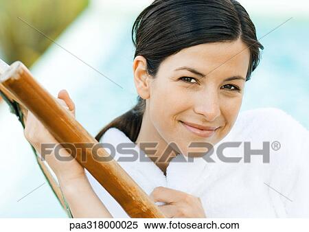 Woman sitting in chair wearing bathrobe, portrait View Large Photo Image Stock Photography - Woman sitting in chair wearing bathrobe, portrait. Fotosearch