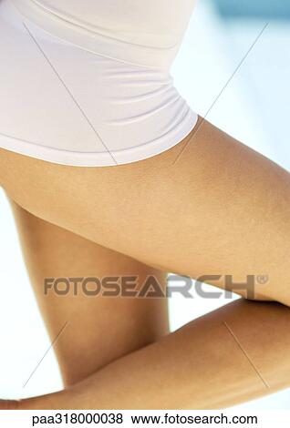 Woman's bent leg, partial view, close-up View Large Photo Image Stock Photo - Woman's bent leg, partial view, close-up. Fotosearch