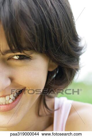 Young woman laughing, cropped, portrait View Large Photo Image Picture - Young woman laughing, cropped, portrait. Fotosearch