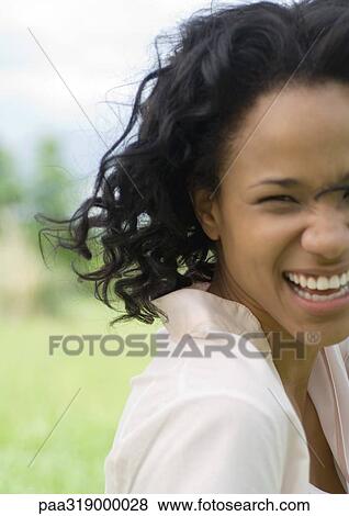 Young woman laughing, portrait View Large Photo Image Stock Photo - Young woman laughing, portrait. Fotosearch