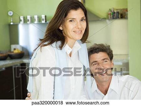 Mature couple in kitchen View Large Photo Image Stock Photo - Mature couple in kitchen. Fotosearch