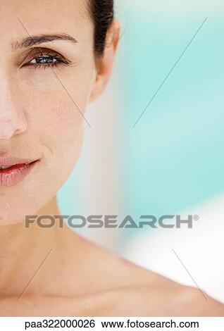 Stock Photograph - Woman's face, partial view. Fotosearch