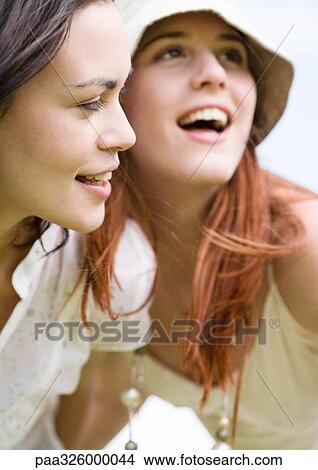 Two young women View Large Photo Image Picture - Two young women. Fotosearch