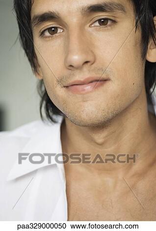 Man wearing unbuttoned dress shirt, close-up View Large Photo Image Stock Image - Man wearing unbuttoned dress shirt, close-up. Fotosearch
