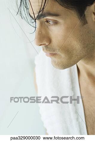 Man with wet hair and towel over shoulder View Large Photo Image Stock Image - Man with wet hair and towel over shoulder. Fotosearch