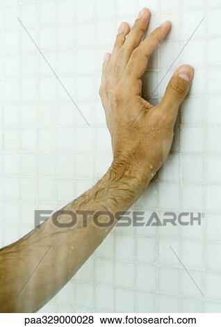 Man's hand on shower wall View Large Photo Image Stock Photo - Man's hand on shower wall. Fotosearch