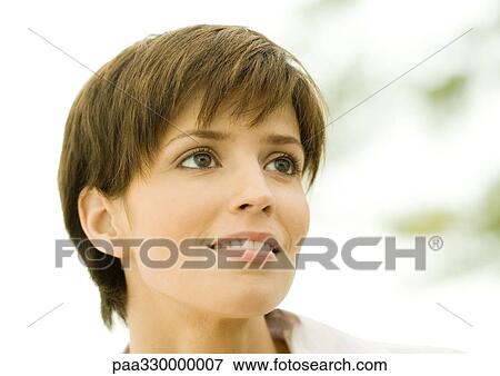 Woman smiling View Large Photo Image Stock Photo - Woman smiling. Fotosearch