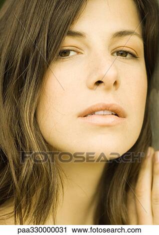 Woman's face, looking at camera View Large Photo Image Stock Image - Woman's face, looking at camera. Fotosearch