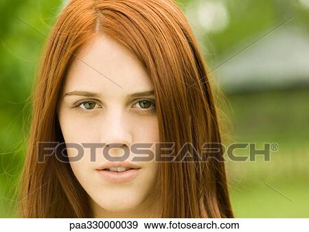Young red-haired woman, portrait View Large Photo Image Stock Photo - Young red-haired woman, portrait. Fotosearch