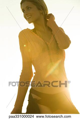 Woman smiling in sun View Large Photo Image Picture - Woman smiling in sun. Fotosearch