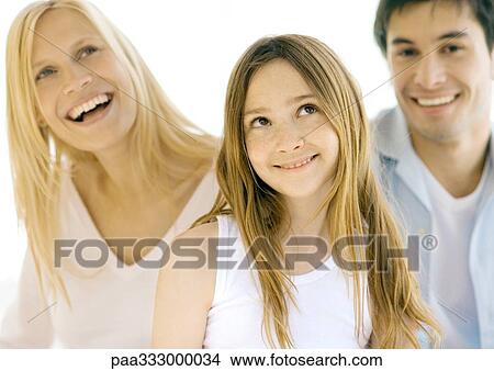 Girl with parents, portrait View Large Photo Image Picture - Girl with parents, portrait. Fotosearch