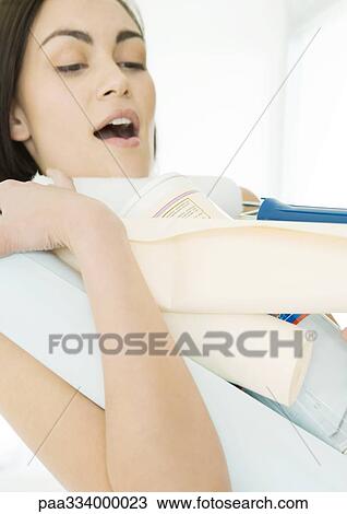 Stock Image - Woman dropping painting supplies. Fotosearch