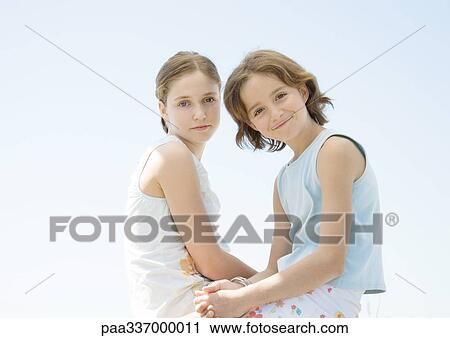 Stock Image - Two girls, portrait. Fotosearch