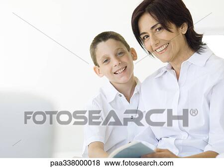 Boy and grandmother smiling View Large Photo Image Stock Photo - Boy and grandmother smiling. Fotosearch