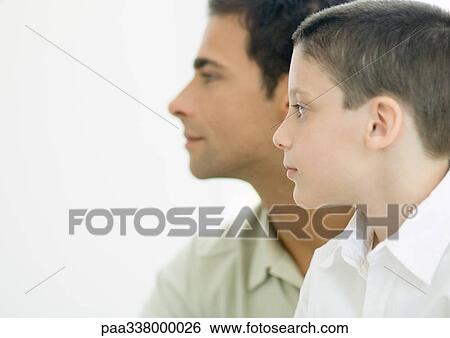 Stock Photograph - Father and son, profile. Fotosearch