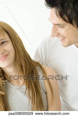 Preteen girl and older brother View Large Photo Image Stock Photo - Preteen girl and older brother. Fotosearch