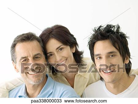 Young man with parents, portrait View Large Photo Image Stock Image - Young man with parents, portrait. Fotosearch