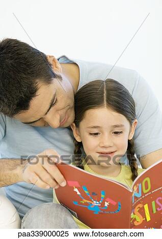 Father and daughter reading book together View Large Photo Image Stock Photography - Father and daughter reading book together. Fotosearch