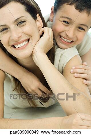 Woman and son, portrait View Large Photo Image Stock Photo - Woman and son, portrait. Fotosearch