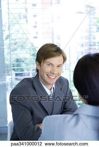 Businessman smiling at camera View Large Photo Image Stock Image - Businessman smiling at camera. Fotosearch