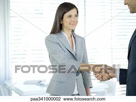 Businesswoman shaking hands View Large Photo Image Stock Image - Businesswoman shaking hands. Fotosearch