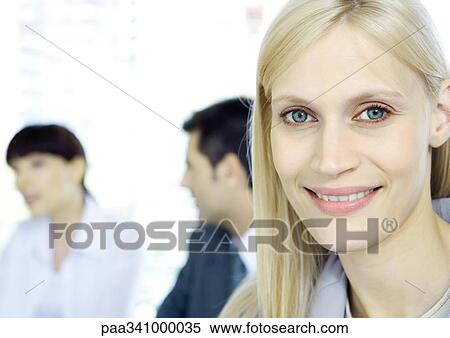 Businesswoman smiling at camera, portrait View Large Photo Image Stock Photography - Businesswoman smiling at camera, portrait. Fotosearch