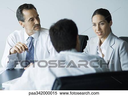 Stock Photography - Business meeting. Fotosearch