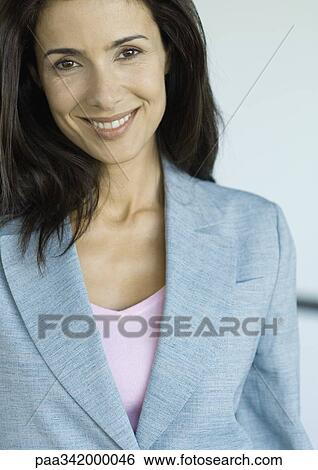 Businesswoman smiling, portrait View Large Photo Image Stock Photograph - Businesswoman smiling, portrait. Fotosearch