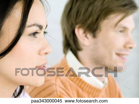 Stock Photography - Couple, close-up, side view. Fotosearch