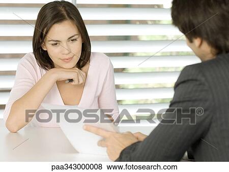 Woman having meeting with businessman View Large Photo Image Stock Photo - Woman having meeting with businessman. Fotosearch