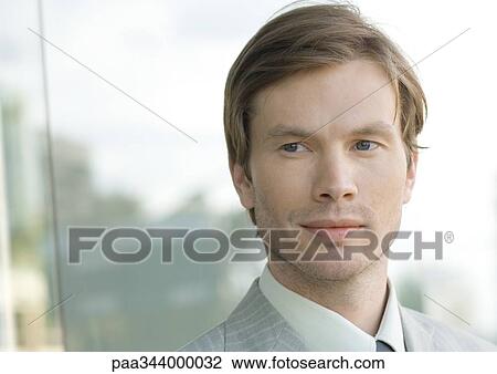 Young businessman, portrait View Large Photo Image Stock Image - Young businessman, portrait. Fotosearch
