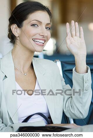 Woman waving View Large Photo Image Stock Image - Woman waving. Fotosearch