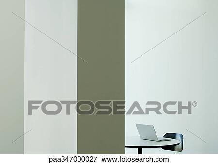 Laptop on table, partial view View Large Photo Image Stock Photo - Laptop on table, partial view. Fotosearch