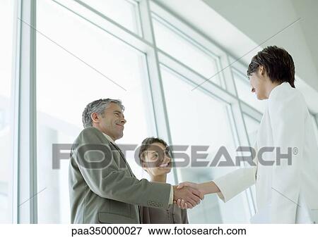 Businesspeople shaking hands View Large Photo Image Stock Photo - Businesspeople shaking hands. Fotosearch