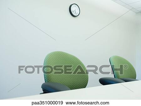 Empty chairs at conference table View Large Photo Image Stock Photo - Empty chairs at conference table. Fotosearch
