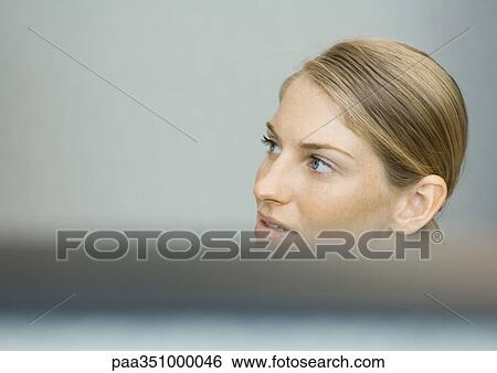 Woman looking away, partial view View Large Photo Image Stock Photograph - Woman looking away, partial view. Fotosearch