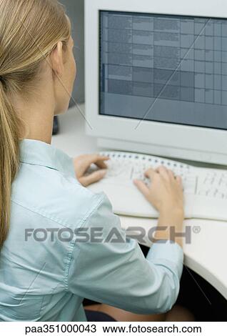 Woman using computer View Large Photo Image Stock Image - Woman using computer. Fotosearch